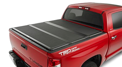 Folding Tonneau Cover on a red Toyota Tundra TRD Off-Road