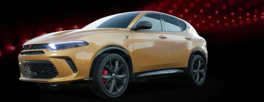 Side view of the 2023 Dodge Hornet Yellow