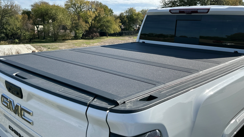 GMC pickup truck bed with hard tonneau cover